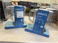 Lot of 2 britas filter system water jugs