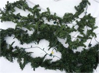 Approx. 30' total faux pine garland with lights.