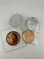 Two One Ouce Copper Coins and Lincoln