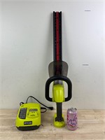 Handheld Cordless Ryobi Saw with Charger untested