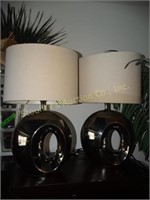 2 glass chrome colored lamps, shades show wear,