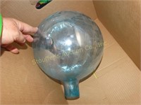 Blue glass gazing ball