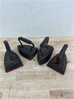 Vintage cast iron irons x4