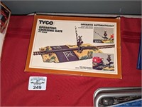 Tyco Operating crossing gate & model signage