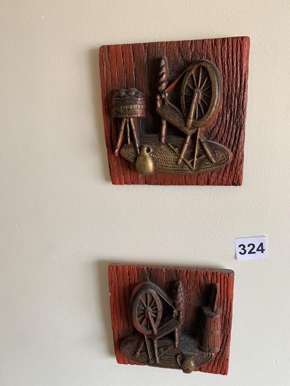 TWO SPINNING WHEEL PLAQUES
