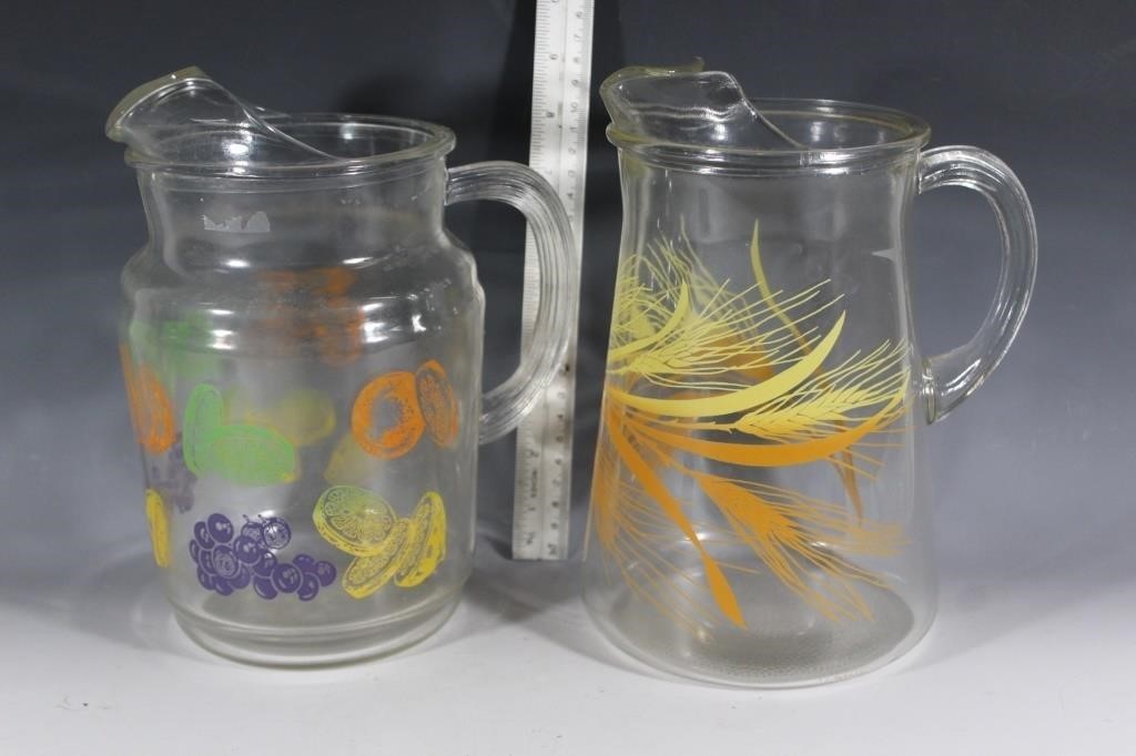 Two VTG glass pitchers