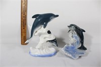 Pair of ceramic dolphin figurines