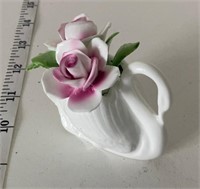 Ceramic flower in swan figurine