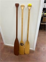 Three wood oars