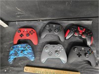6 xbox controllers