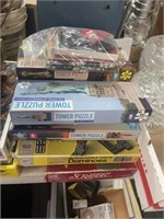 STACK OF GAMES AND PUZZLES