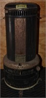 105B: Antique Florence Oil Heater, 26” tall