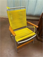 Vintage yellow folding patio chair