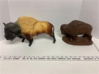2 buffalo statues