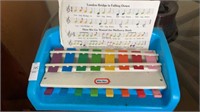 Little Tikes toy keyboard & music sheets
