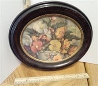 Floral Print In Oval Frame