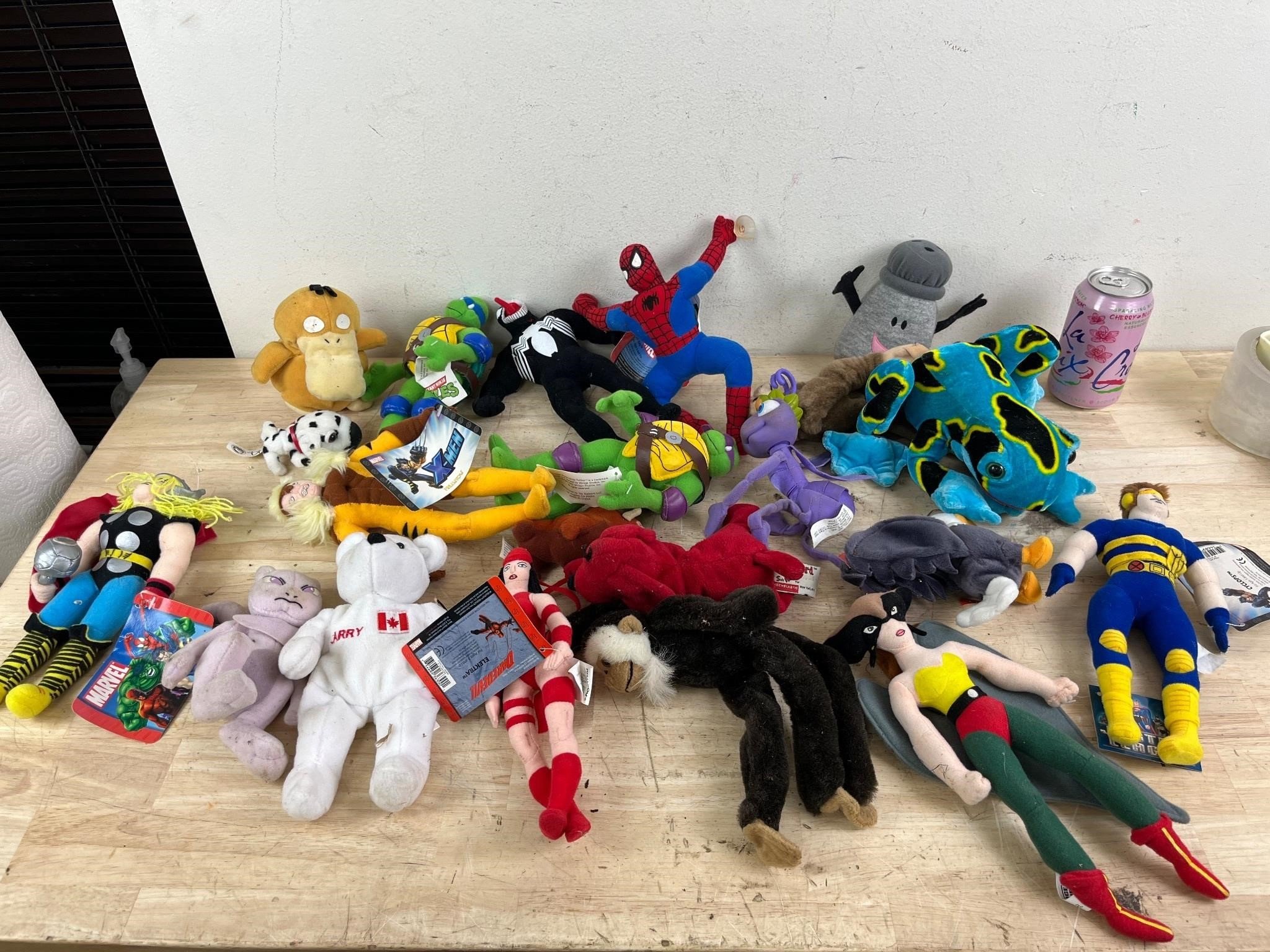 Stuffed animals lot with Pokémon and marvel