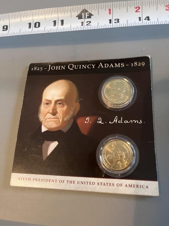 John Quincy Adams collectible one dollar coins.