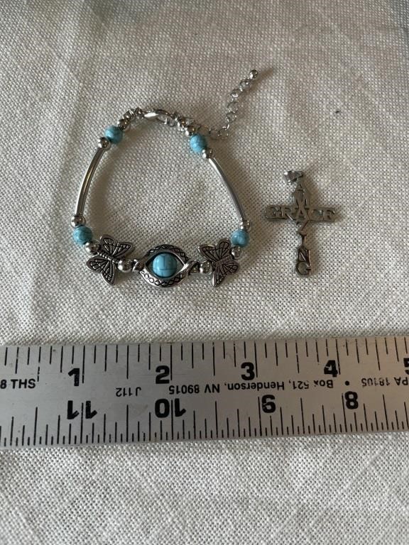Women’s bracelet and necklace charm
