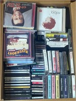 Box of CDs and cassettes