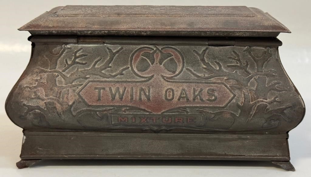 ORNATE ANTIQUE TWIN OAKS FOOTED TOBACCO TIN