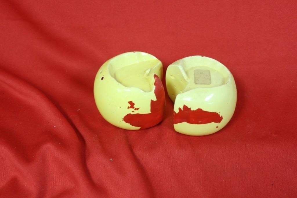 A Pair Of Cheese Form Salt And Pepper Shakers