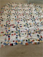 Double wedding ring quilt top measuring 81"x93"