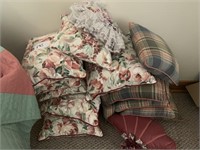 14 pillows:  7 floral, 5 plaid, 2 combo