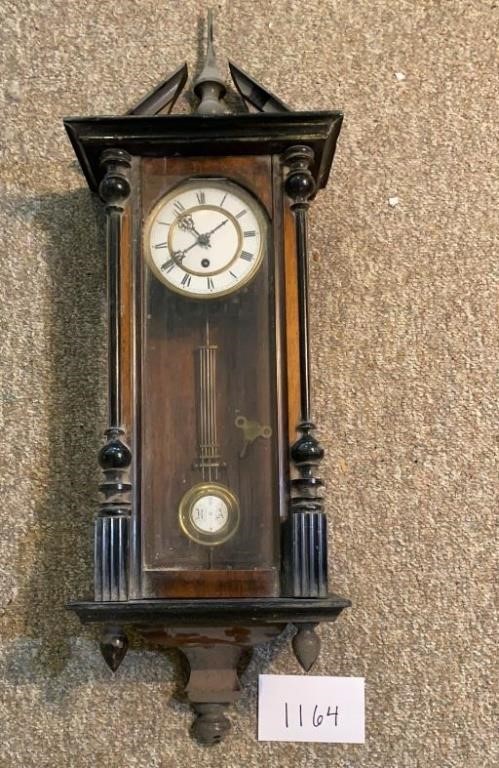 Antique Wall Clock w/ Winding Key

 Condition