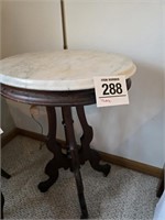 Marble top wheeled table 29" t x 21" x 14" (top...