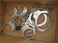 Assorted Handcuffs and one key