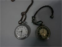 two pocket watches, one works, one doesn't