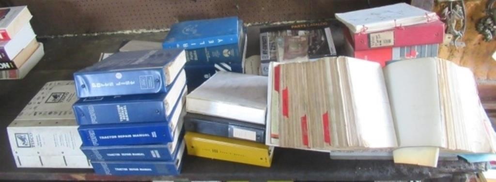 Large assortment of repair manuals.