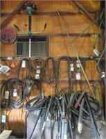 Assortment of belts, hydraulic hoses, weed whip,