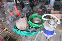 Vacuum, oil drain pans, garden hose, live trap,