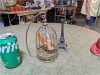 Small Caged Bird & Eiffel Tower
