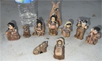 Very small native family figurines