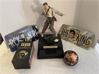 Elvis clock, license plates, movies, ball