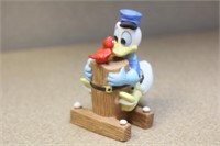 Disney Donald Duck and bird figure