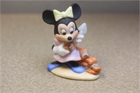 Disney lady mouse figurine