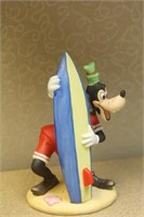 Disney snoopy surfing figure