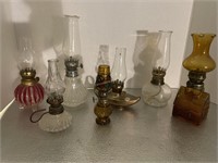 7 small oil lamps