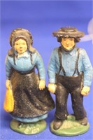 Pair of Cast Iron Man and Woman Figurines