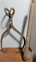 ANTIQUE TONGS AND HOLE