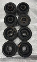 8 - 4” x 2” Cast Iron Centers With Rubber Wheels
