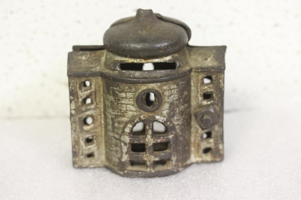 An Old Cast Iron Coin Bank