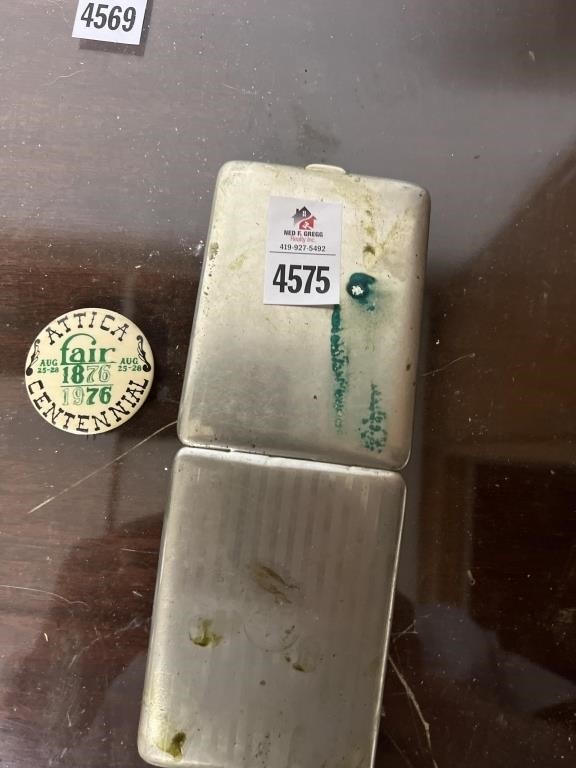 Early metal wallet, & Attica fair pin