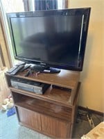 PANASONIC FLAT SCREEN TV ON STAND W/ TOSHIBA VHS,