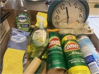 Kitchen cleaning supplies, clock,