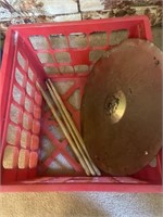 Symbol,  three drumsticks, plastic crate